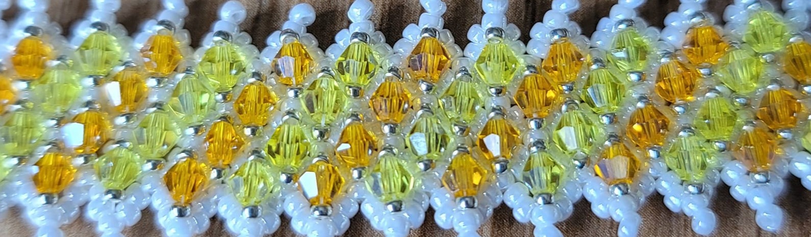 Handmade beaded jewellery detail showing colourful glass beads and craftsmanship